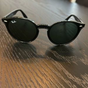 Ray-Bans. Great condition. Black - round with slight cat eye frames